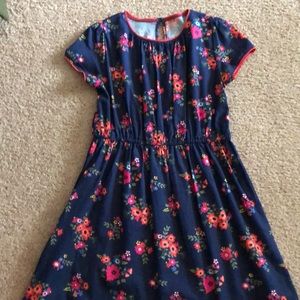 Adorable girls navy dress with flowers.